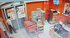 Store door accident knocks over egg trays in Medellín, Colombia
