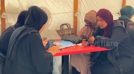 Palestinian students take exams electronically under threat of Israeli attack in Gaza