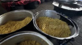 Charity distributes hot meals to displaced Palestinians in southern Gaza