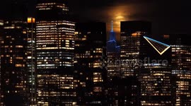 Corn Moon rises above Manhattan skyline in New York