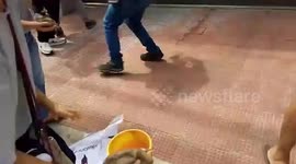 Furious protesters throw mud at office of 'corrupt' flood control contractor