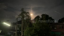 Lunar eclipse seen in sky above northern Thailand
