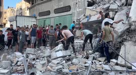 Israeli army bombs house in Gaza's al-Shati refugee camp, dozens trapped under rubble