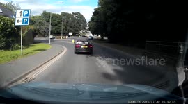 BMW passengers use hand signals at roundabout