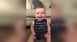 Baby laughs when mom rips up all the junk mail
