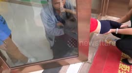 Firefighters rescue boy stuck in glass door