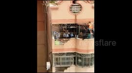 Firefighters rescue boy stuck in security net on seventh floor