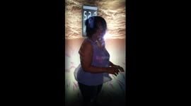 My mother in-law  in the hurricane simulator!