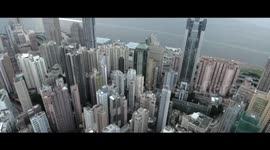 Man free climbs crane mounted on top of a skyscraper in Hong Kong