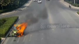 Car bursts into flames while waiting at traffic lights