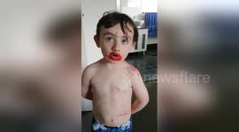 Cheeky three-year-old boy blames sister for covering him in lipstick