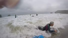 Riding some huge waves in Portreath Cornwall! Couple bodyboarding with the GoPro