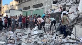 Israeli army bombs house in Gaza's al-Shati refugee camp, dozens trapped under rubble
