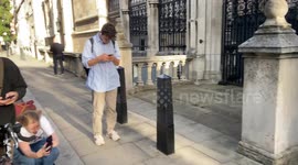 Court staff cover up image Allegedly showing Judge Beating Protestor by Banksy
