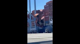 Shipping containers plunge into sea at port in California