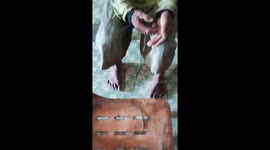 A farmer, bitten by a cobra he claims to have killed, seeks medical help. The doctor surprisingly advises him to consult a renowned traditional healer with a legacy of saving countless lives from venomous snake bites, mostly fisherman. They tightly tie th
