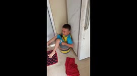My son hilariously stuck in big bucket, mom saves him