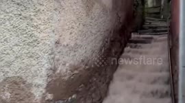 Italy: Firefighters Dramatically Rescue Car From Flooded Ditch During Italy Storms