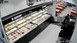 Man saves toddler from being crushed by large cabinet at Chinese restaurant