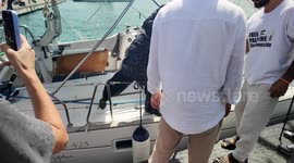 Siracusa, Italy – 11 Sep 2025: Participant disembarks from Global Sumud Flotilla boat