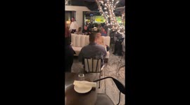 Man catches girlfriend off-guard with a cute surprise proposal at her birthday dinner