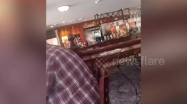 Man throws chair at bouncer in