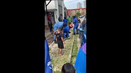 Firemen catch giant monitor lizard outside family's home