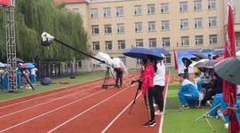 Student fires confetti cannon at graduation event and trips on stage
