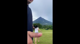 Boyfriend slips during running challenge near Mayon Volcano in Camalig, Philippines