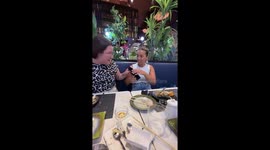 Playful mishap topples restaurant partition in Valencia, Spain
