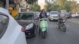 Women in Tehran push boundaries by riding motorcycles despite restrictions