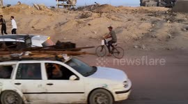 Palestinians flee northern Gaza amid Israeli attacks, evacuation orders