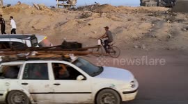 Palestinians flee northern Gaza amid Israeli attacks, evacuation orders