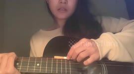 Guitar cigarette trick in Jiangsu, China