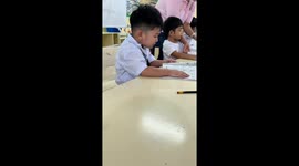 Little boy cries not wanting to write in Pampanga, Philippines