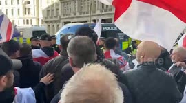 Clashes erupt between police and protesters at anti-immigration march in London organized by Tommy Robinson