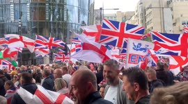Tommy Robinson supporters sing and dance in Trafalgar Square
