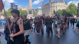 Anti-fascist protestors march through London's Trafalgar Square