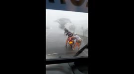 Holding Bikes Down in a Brutal Wind Storm