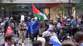 Police intervene as counter-protestors try to block anti-immigration rally in Toronto