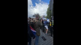 Kicking off in london - Punches and clashes between protesters in london today - police trying to do their best but so many protesters on the street ….