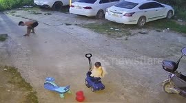 Dad’s quick reflexes save daughter from hitting her head on concrete
