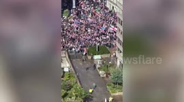 Shocking moment Tommy Robinson fans break into hospital grounds and