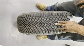 tire mechanic showing tread design