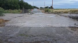 Flash flood blocks Bolton Road in Artesia, USA