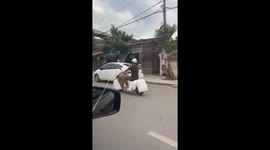 Amusing Snoopy-themed scooter cruises along road