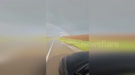 US: Rainbow Appears Over Kansas Highway After Storm