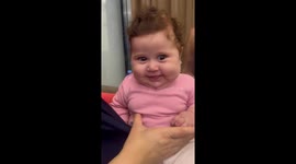 Baby cries as adults sing in Jounieh, Lebanon