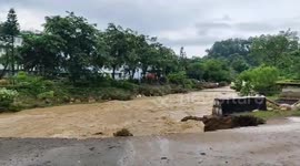 Students rescued after becoming trapped by floods in northern India