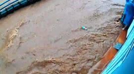 Motorcycles washed away in deluge during floods in Vietnam